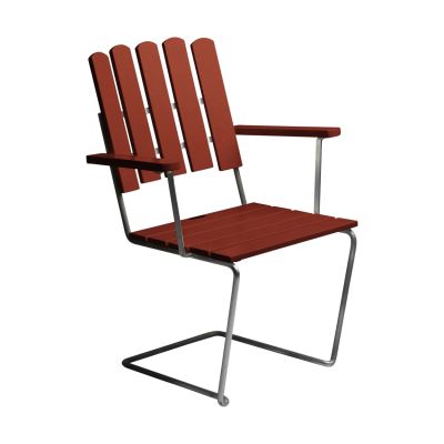 Grythyttan Stålmöbler A2 nojatuoli Tummanpunainen lakattu tammi lämpösinkitty runko